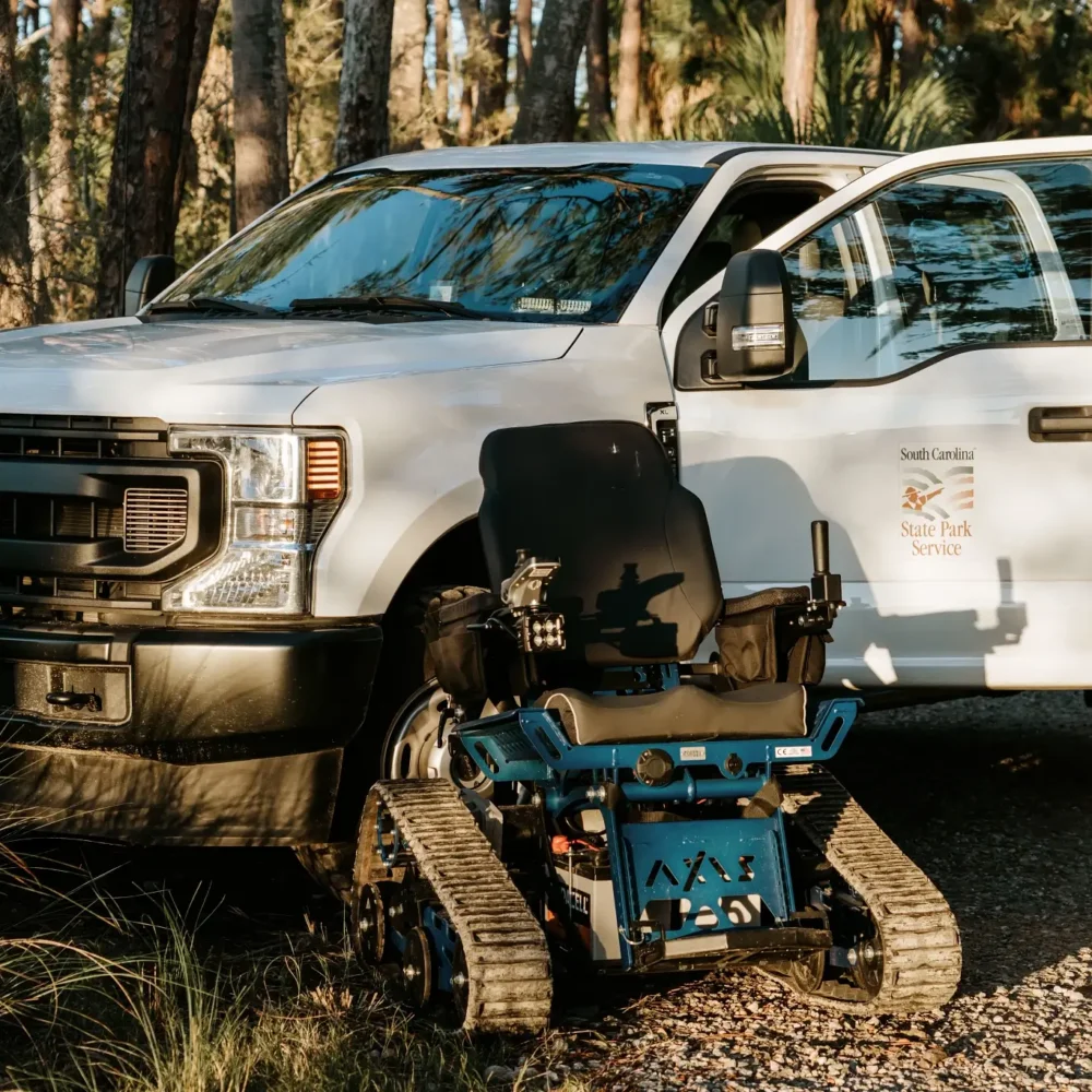 The Action Trackchair AXIS posed with a South Carolina State Parks Truck.