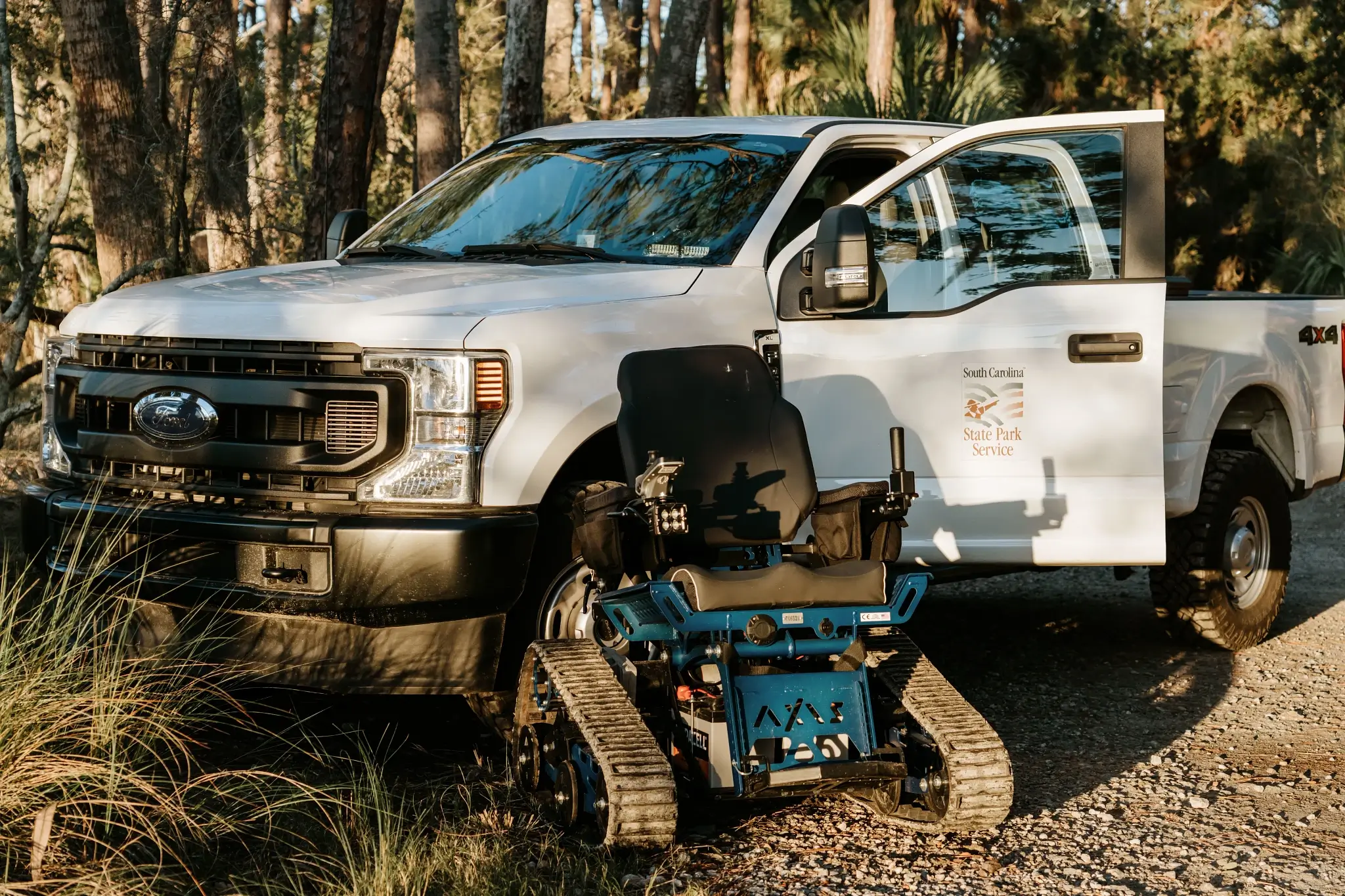 The Action Trackchair AXIS posed with a South Carolina State Parks Truck.
